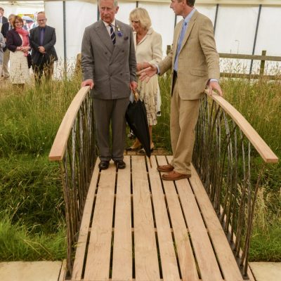 Prince Charles and the Duchess of Cornwall at the Sandringham Flower Show 2013 - Prince Charles talks the Paul Welford. Picture: Matthew Usher.